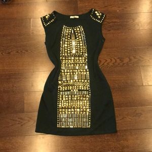 Green and gold tunic dress